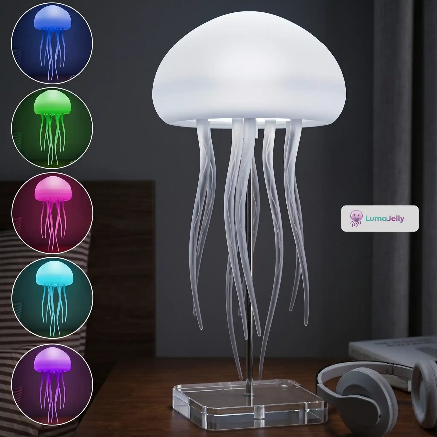 Lámpara de medusas LumaJelly™ en una mesita de noche junto a unos auriculares, destacando los 5 modos de color principales: azul, verde, rosa, cian y púrpura.